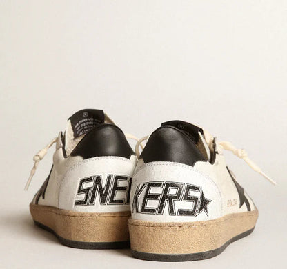 Nappa bianca e stella nera